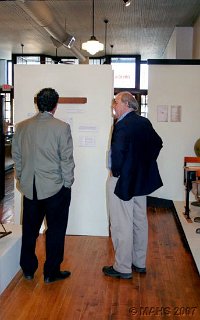 Sen. Jon Erpenbach and Don Schneider viewing the new display panels.